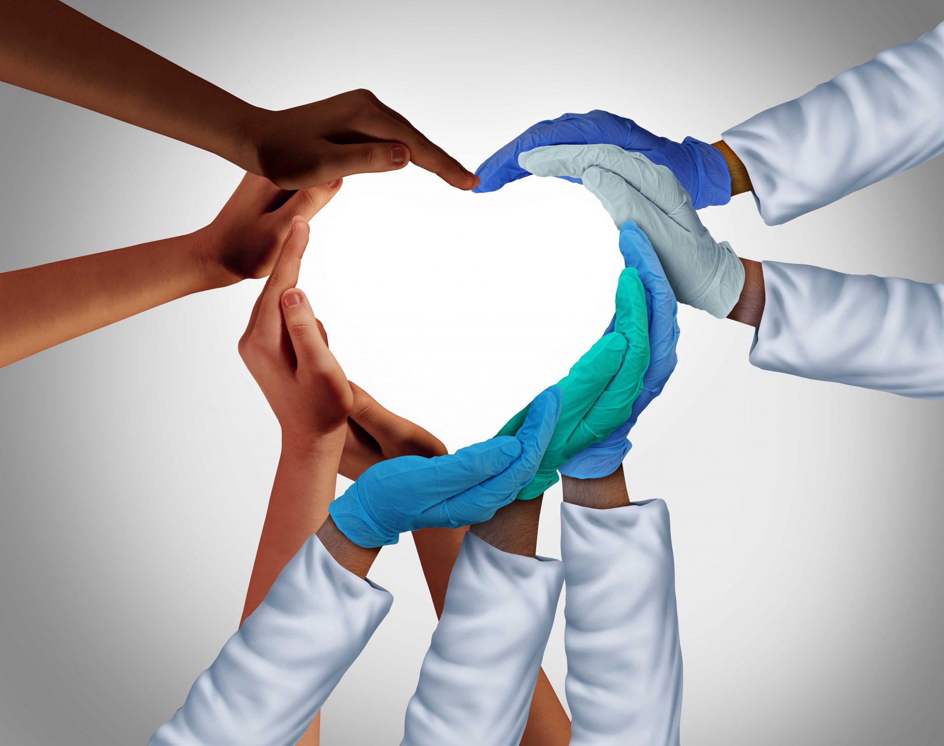 Clincal team member's hands form the shape of a heart.